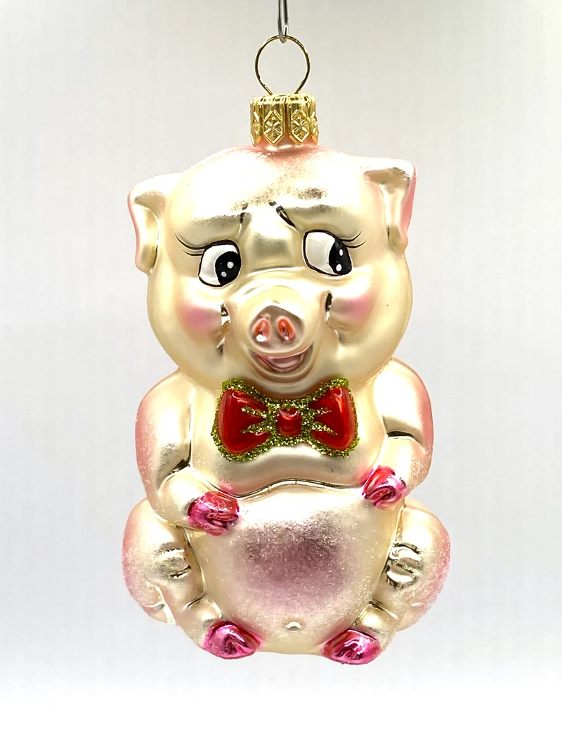 Schweinchen mit rosa Schleife
