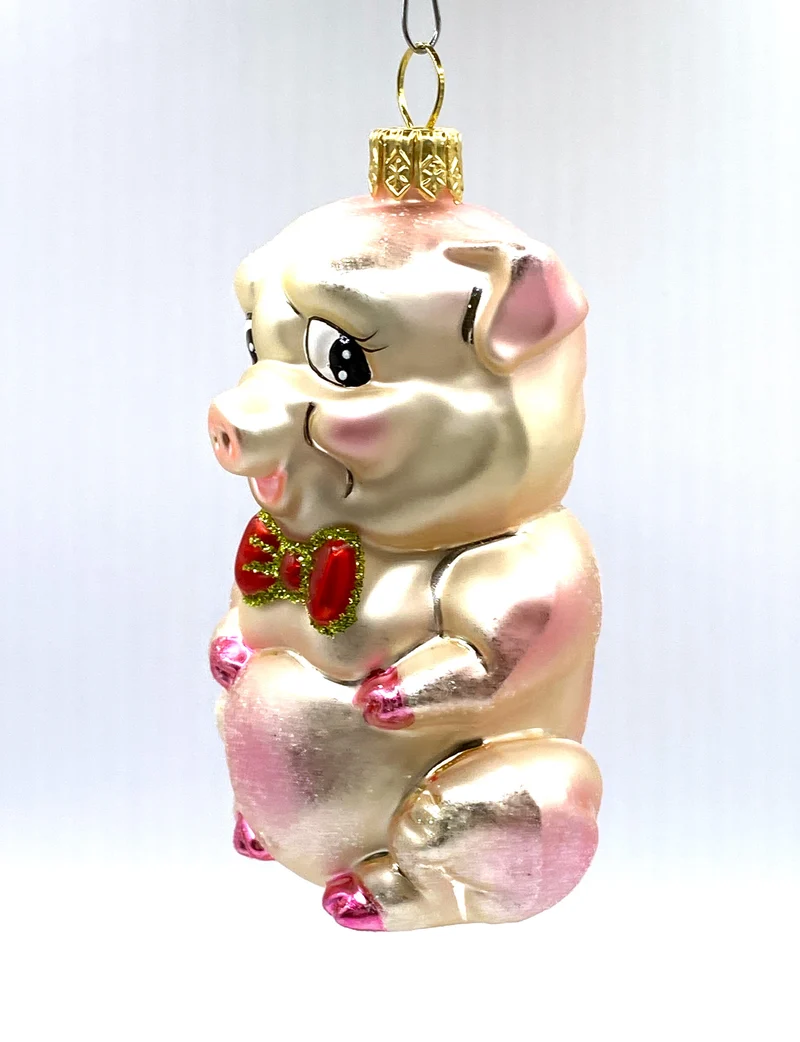 Schweinchen mit rosa Schleife