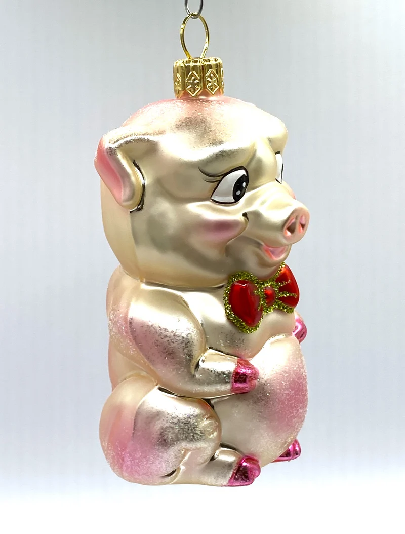 Schweinchen mit rosa Schleife