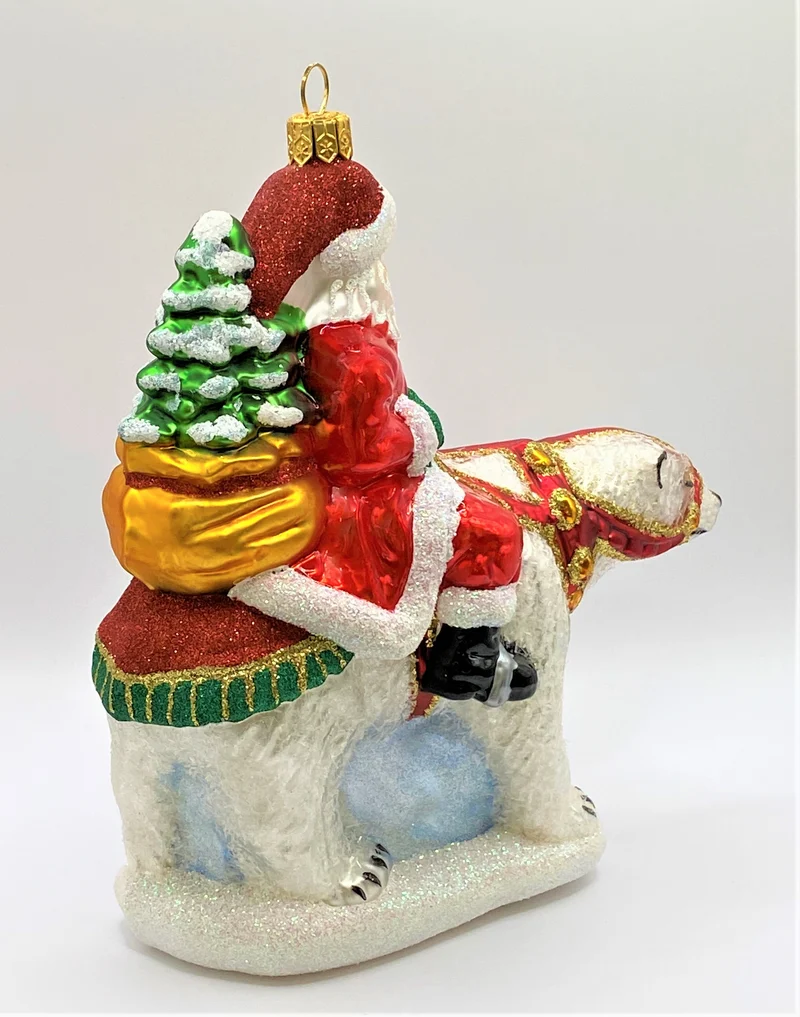 Santa Claus auf Eisbär reitend
