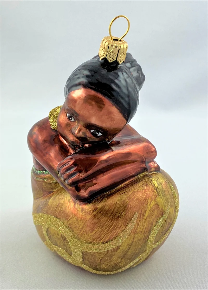 Afrikanisches Mädchen, sitzend