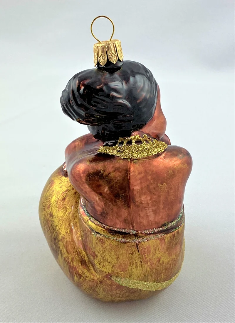 Afrikanisches Mädchen, sitzend