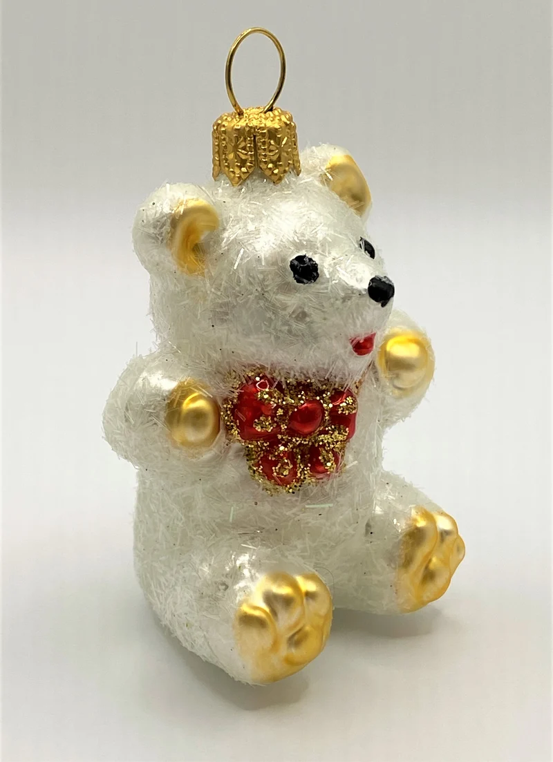 Kleiner sitzender weisserTeddy-Bär