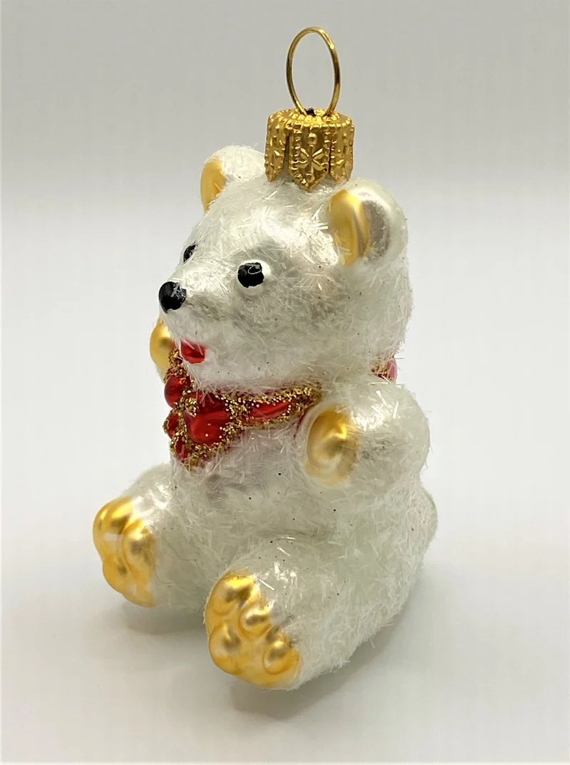 Kleiner sitzender weisserTeddy-Bär
