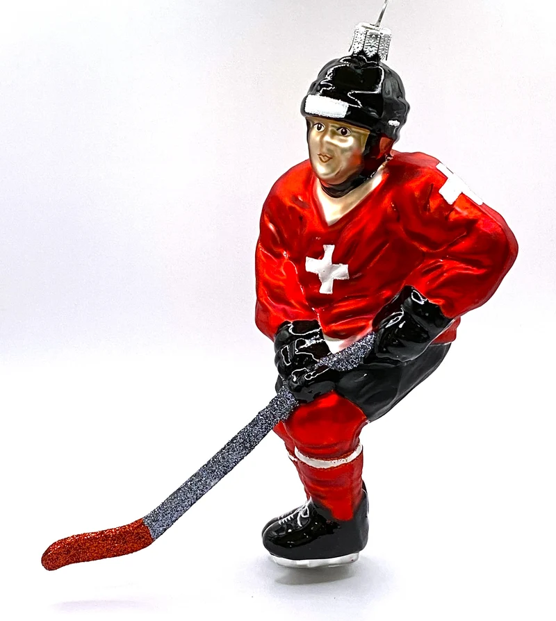 Eishockey Spieler mit Schweizer Kreuz