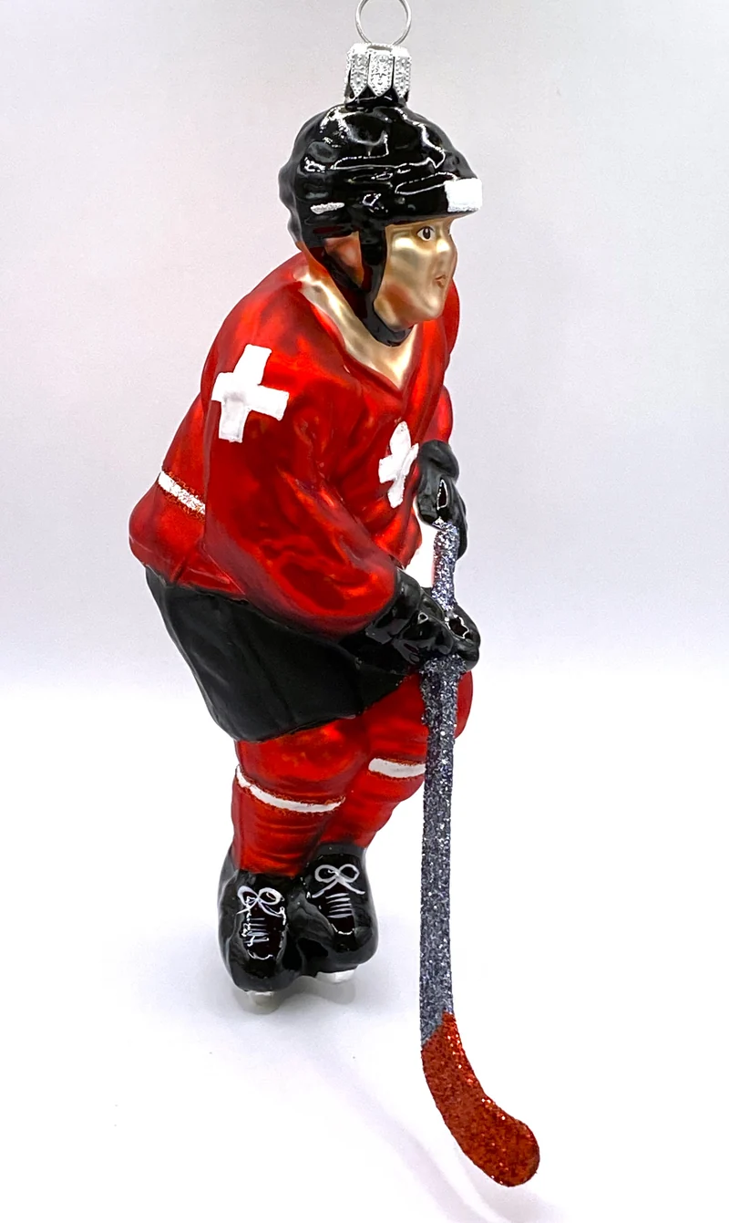 Eishockey Spieler mit Schweizer Kreuz