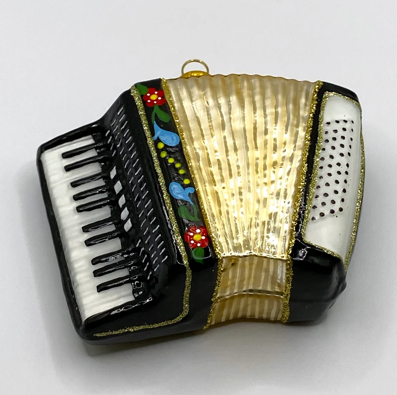 Schwarze Handorgel mit Blumendekor