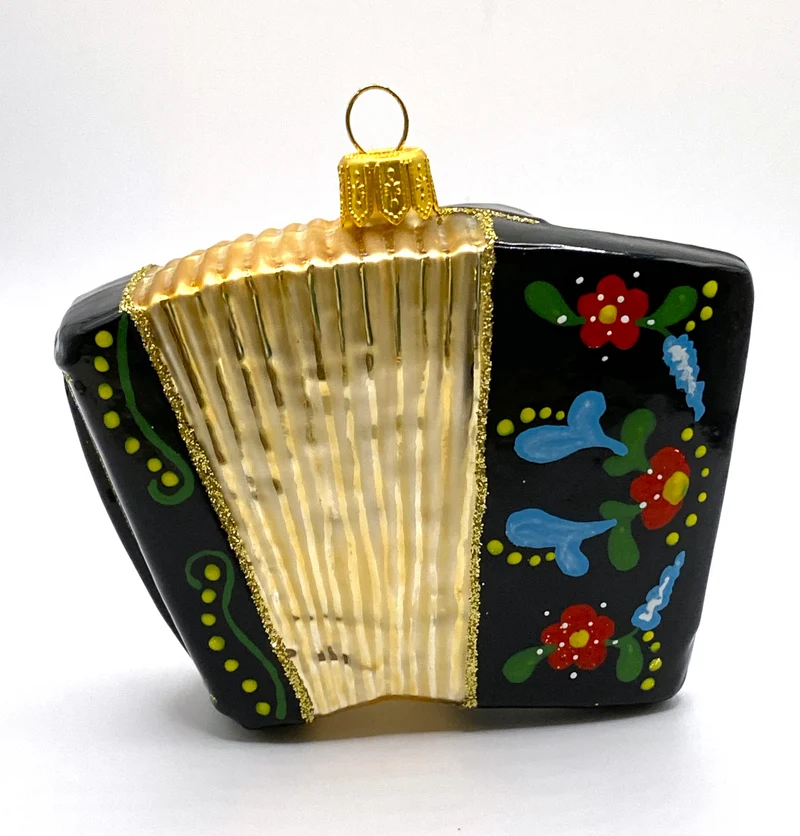 Schwarze Handorgel mit Blumendekor