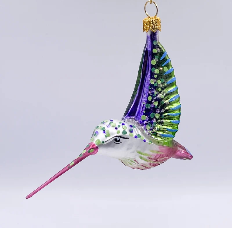 Kolibri fliegend Schnabel violett