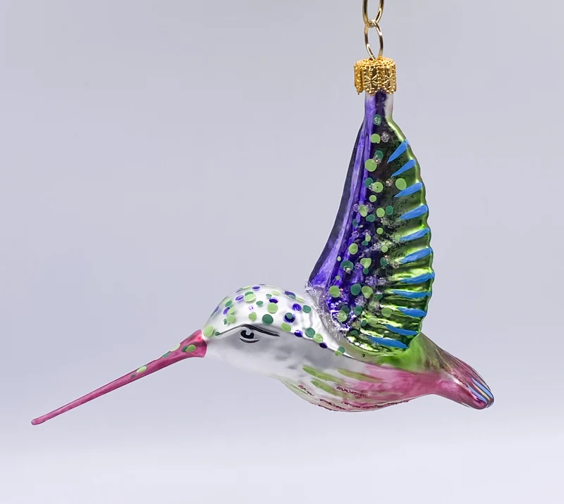 Kolibri fliegend Schnabel violett