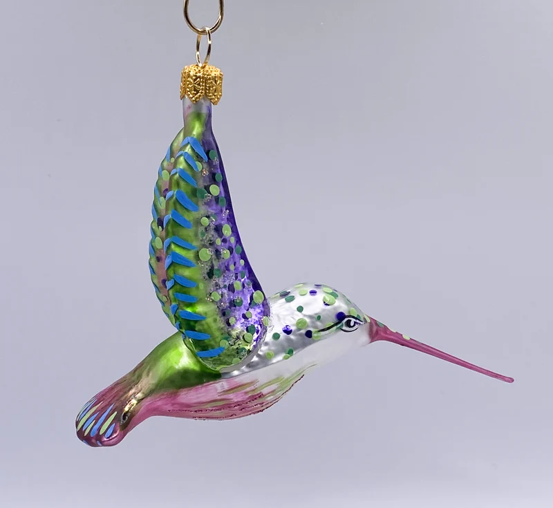 Kolibri fliegend Schnabel violett
