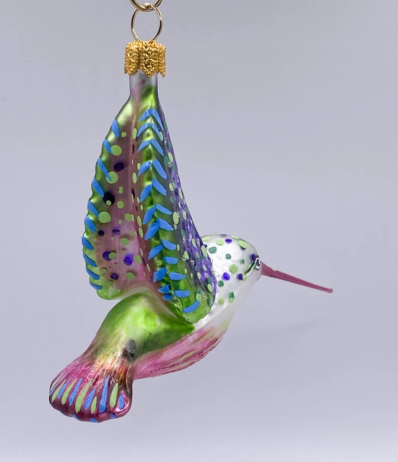 Kolibri fliegend Schnabel violett
