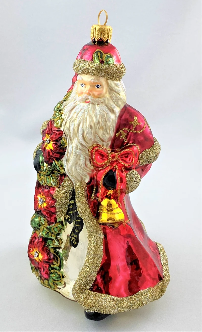 Weihnachtsmann mit Weihnachtsstern und Glocke