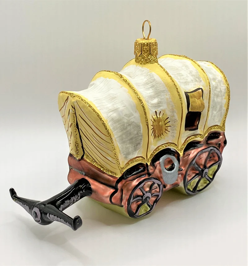 Planwagen mit geflickter Plane
