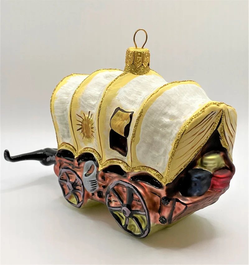 Planwagen mit geflickter Plane