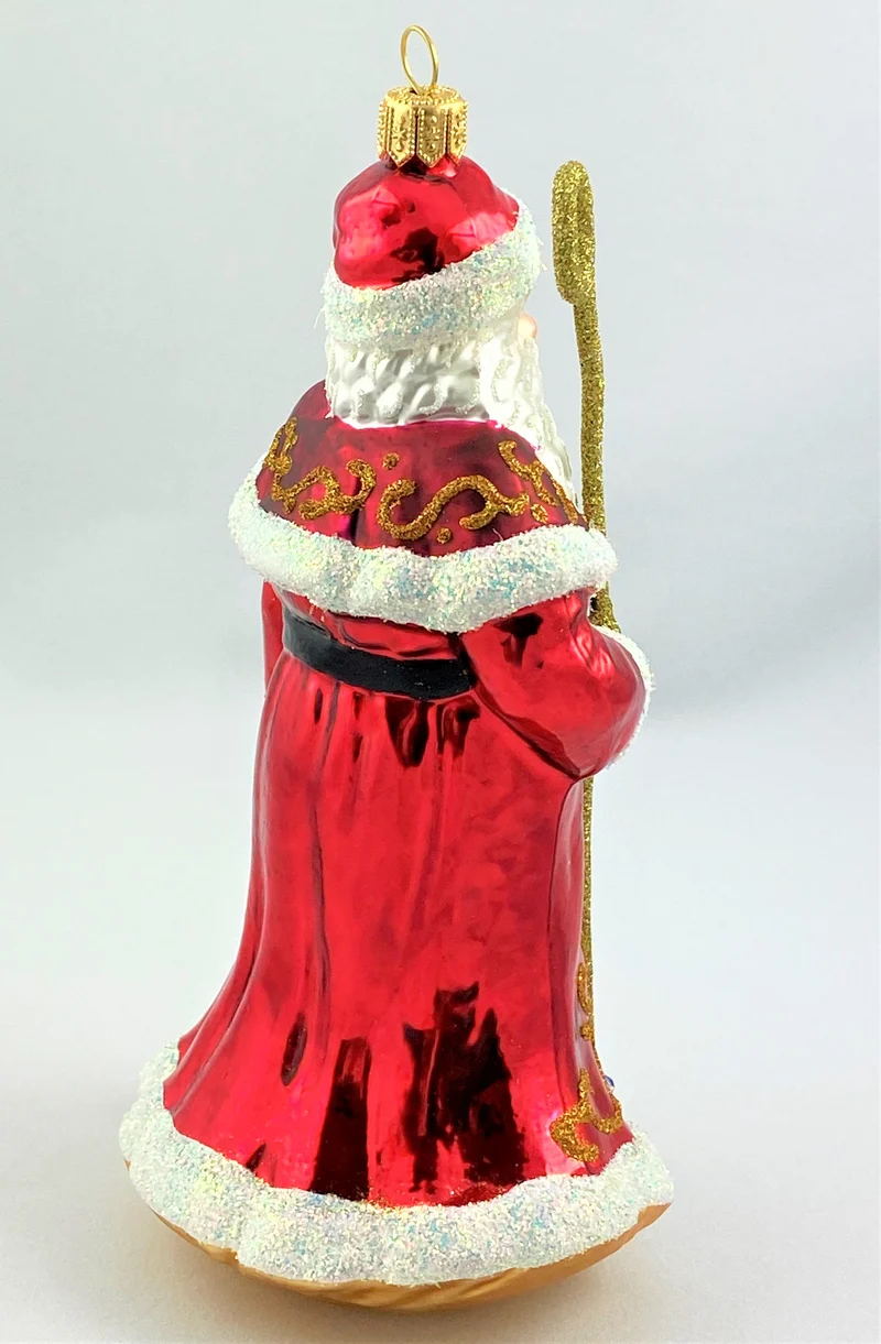 Weihnachtsmann mit goldenem Stab