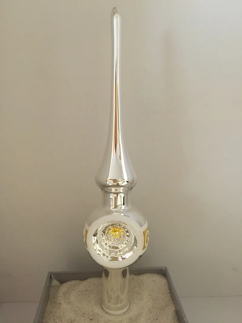 Kleine Spitze mit Reflex gold/weisses Dekor