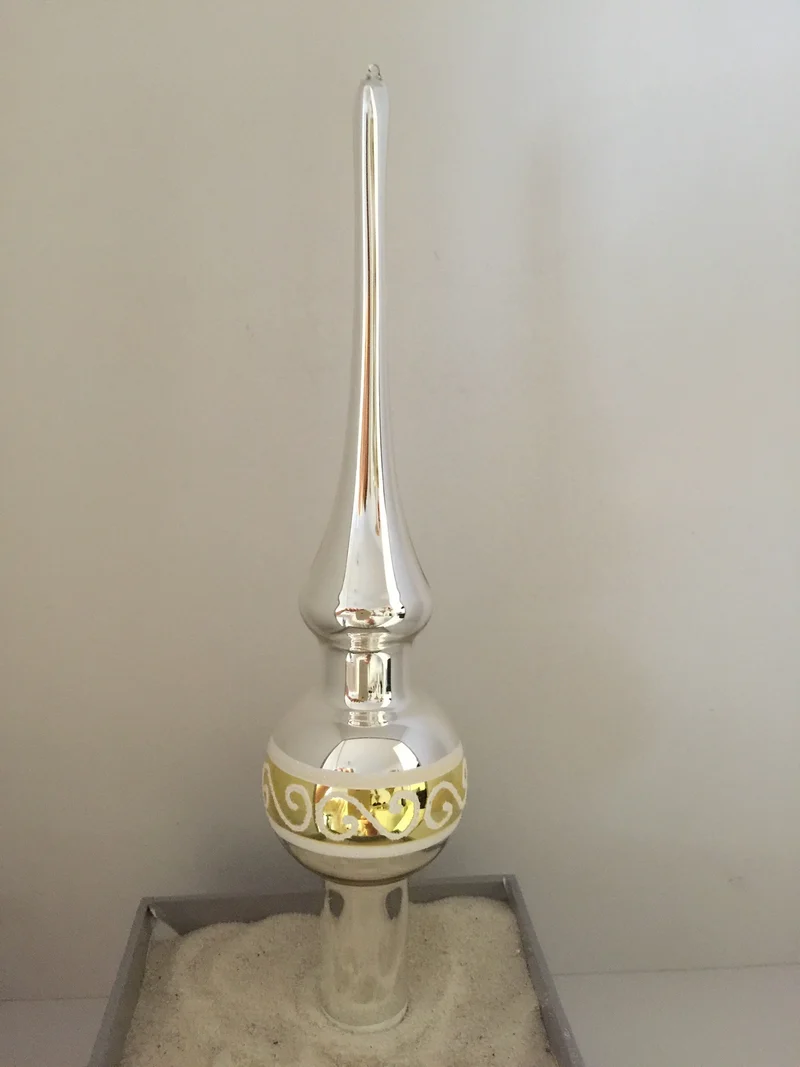 Kleine Spitze mit Reflex gold/weisses Dekor