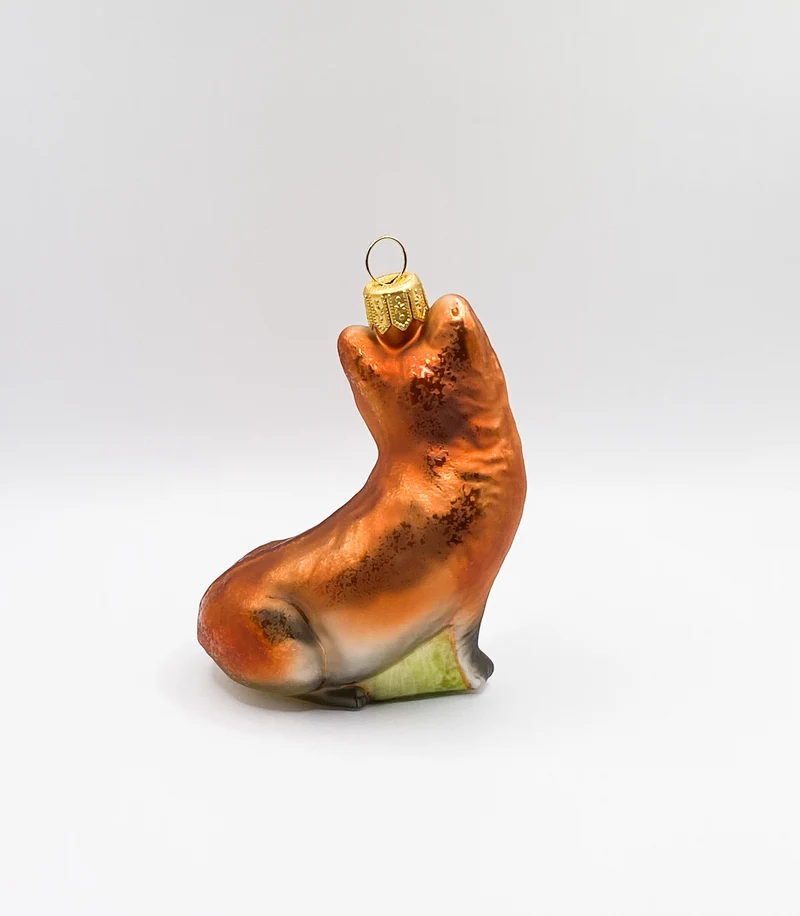 Sitzender verschmitzter Fuchs