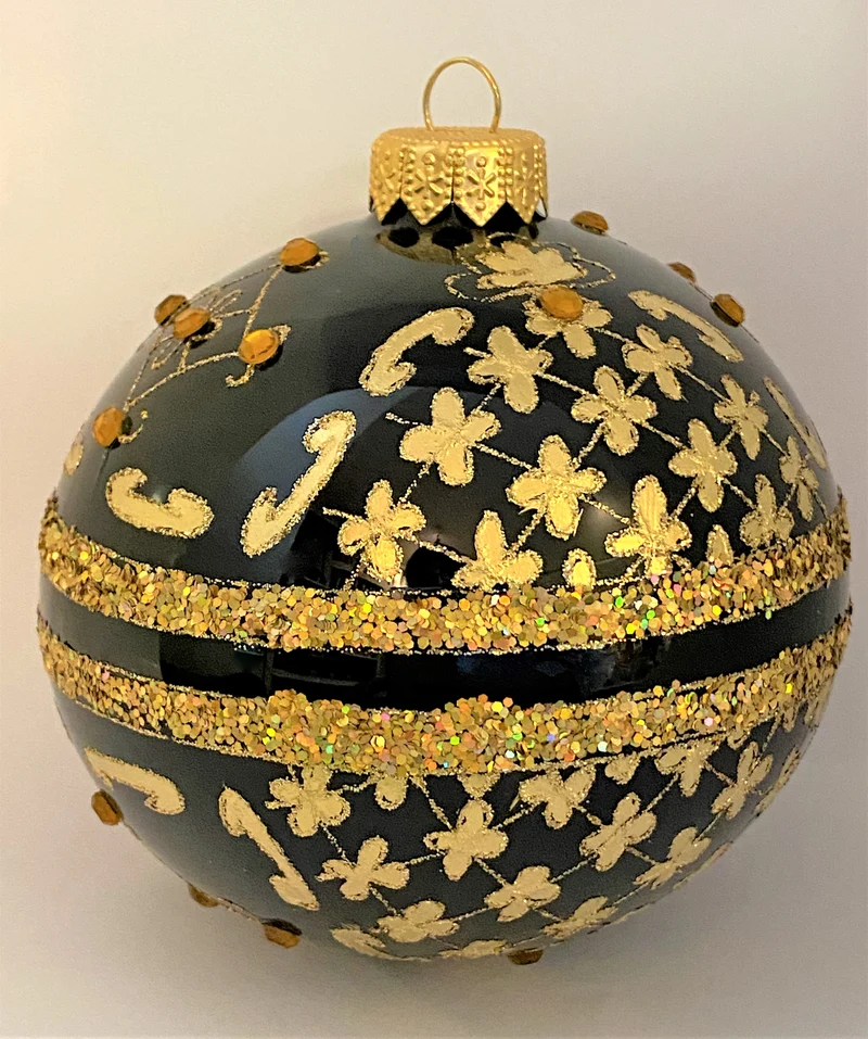 Kugel schwarz mit Golddekor mit Schmucksteinen