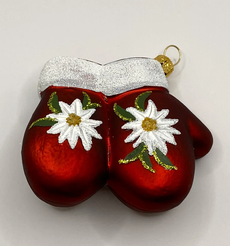 Rotes Paar Handschuhe mit Edelweiss