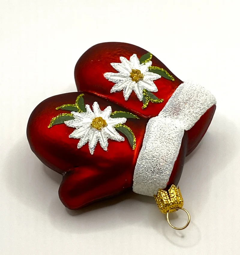 Rotes Paar Handschuhe mit Edelweiss