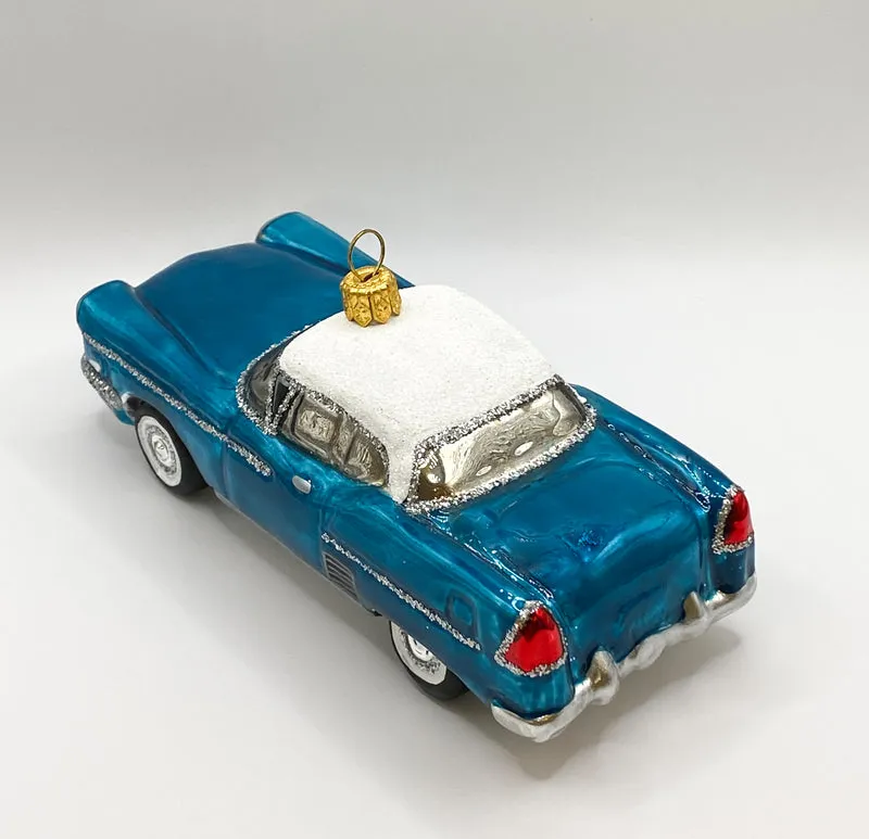 Blauer Vintage Cadillac mit weissem Dach