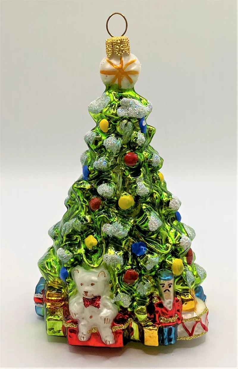 Kleiner Christbaum mit weissem Teddybär und Nussknacker