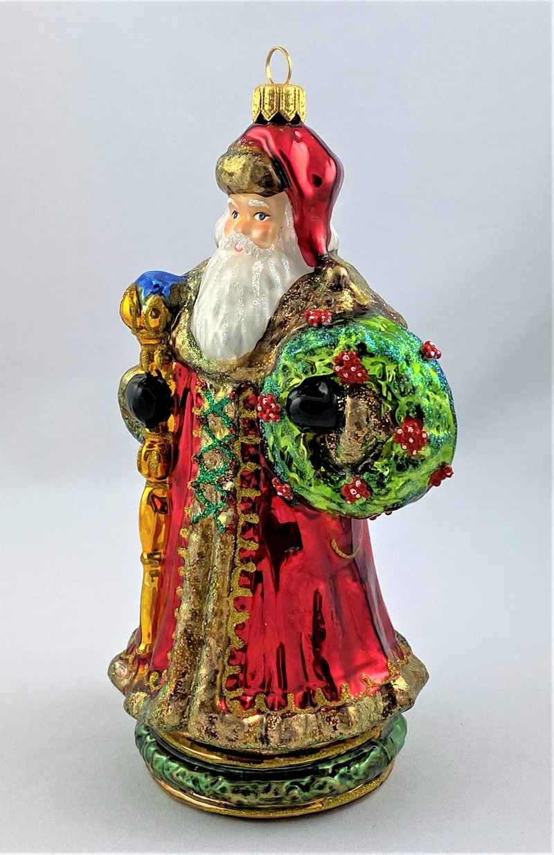 Nikolaus mit langer Mütze, Stab und grünem Kranz