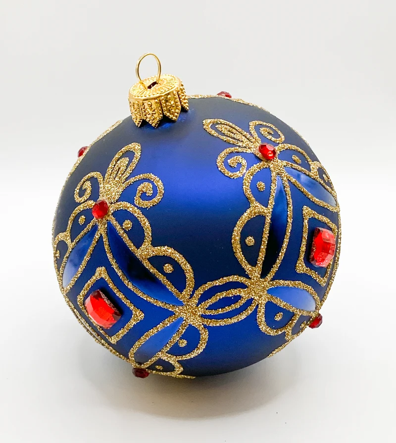 Kugel blau matt mit Golddekor, kleine und grosse rote Steine