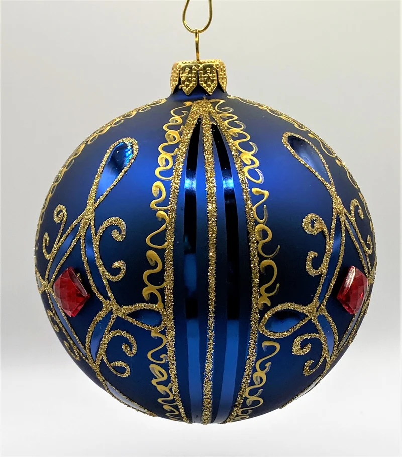 Kugel blau matt mit Golddekor, grosse rote Steine