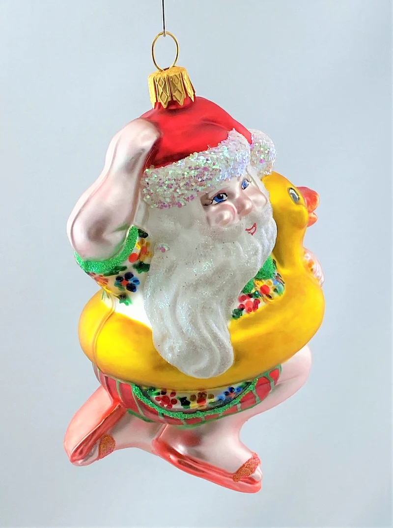 Weihnachtsmann geht mit Enten-Schwimmring baden