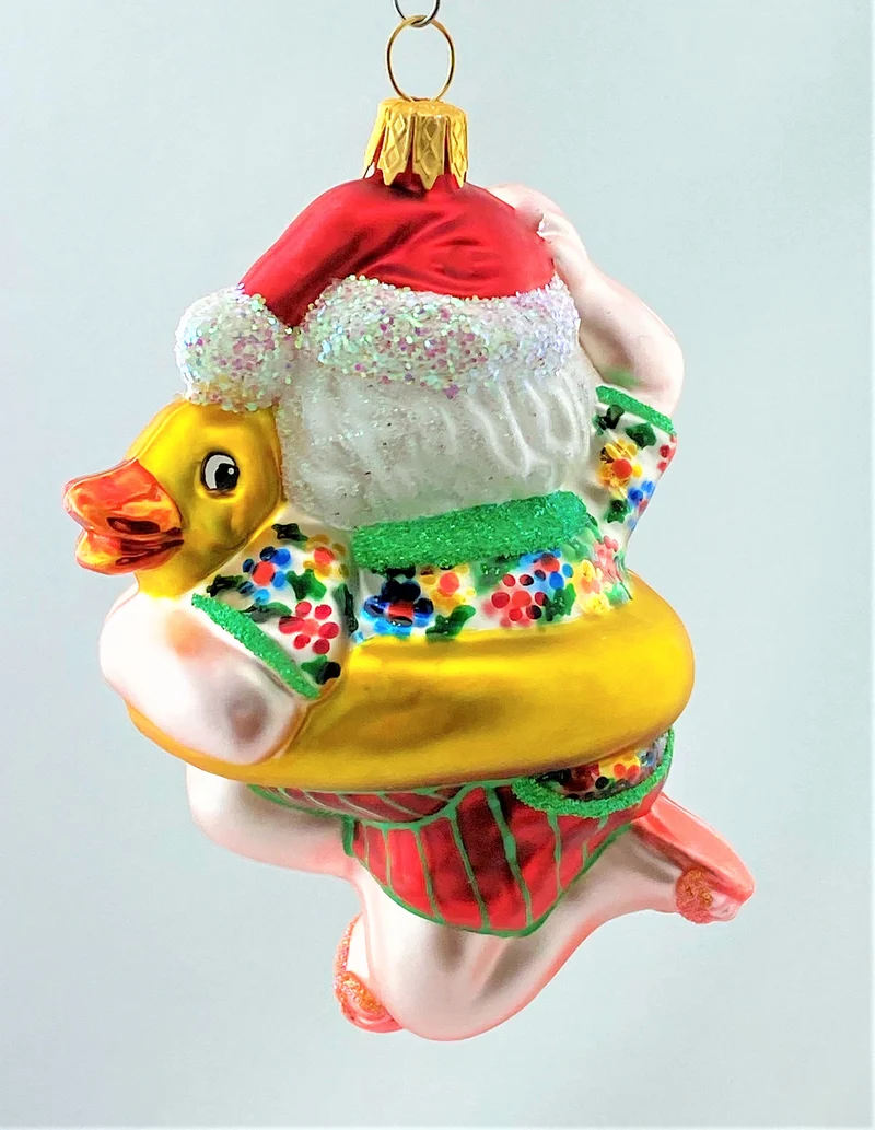 Weihnachtsmann geht mit Enten-Schwimmring baden