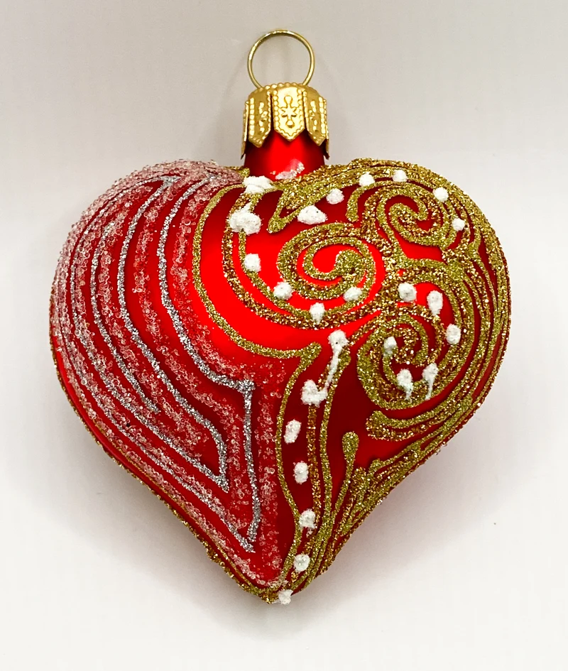 Rotes Herz mit Art-Deko-Muster