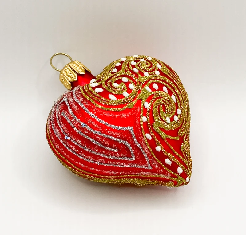 Rotes Herz mit Art-Deko-Muster