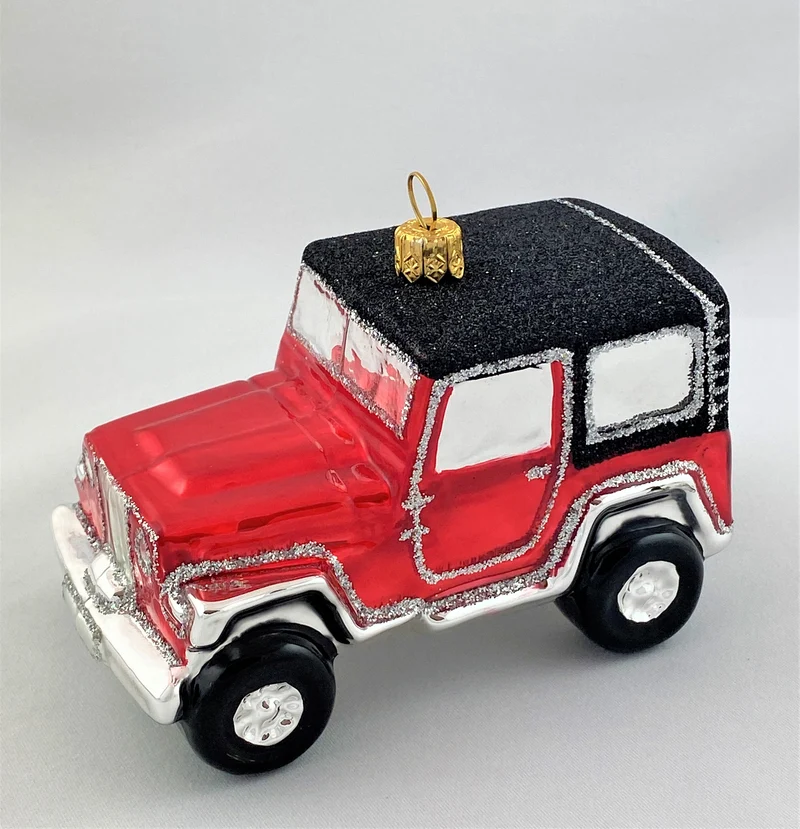 Roter Jeep mit schwarzem Dach