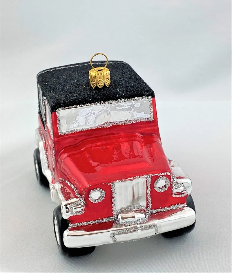 Roter Jeep mit schwarzem Dach