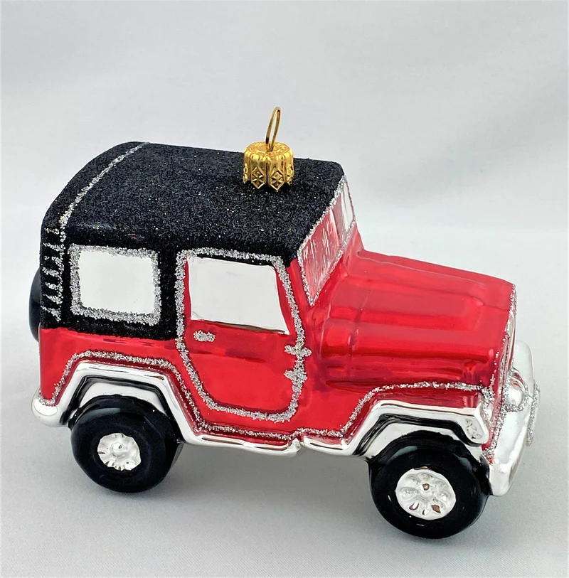 Roter Jeep mit schwarzem Dach