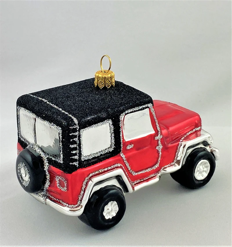 Roter Jeep mit schwarzem Dach