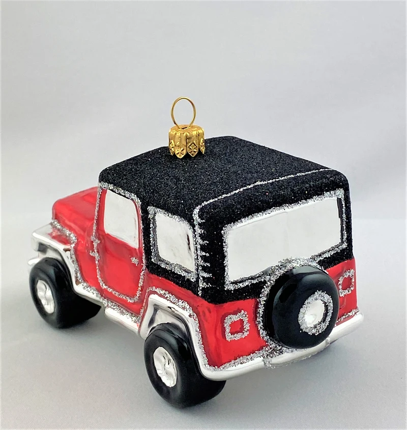 Roter Jeep mit schwarzem Dach