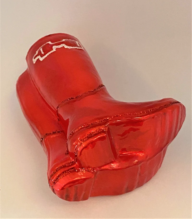 Paar rote Gummistiefel