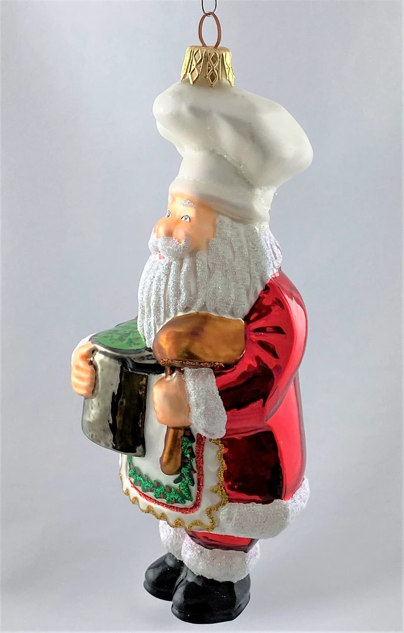 Santa kocht einen grossen Topf Suppe