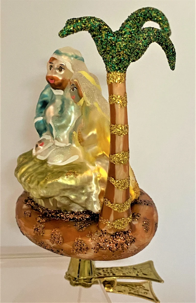 Die Heilige Familie unter Palmen