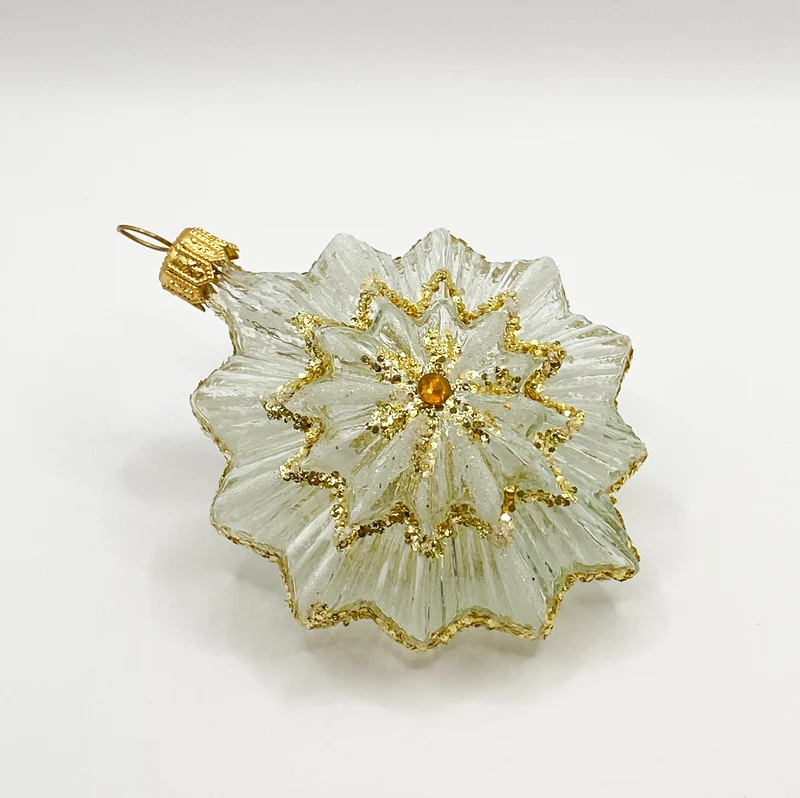 Stilisierter Stern transparent mit Gold-Dekor