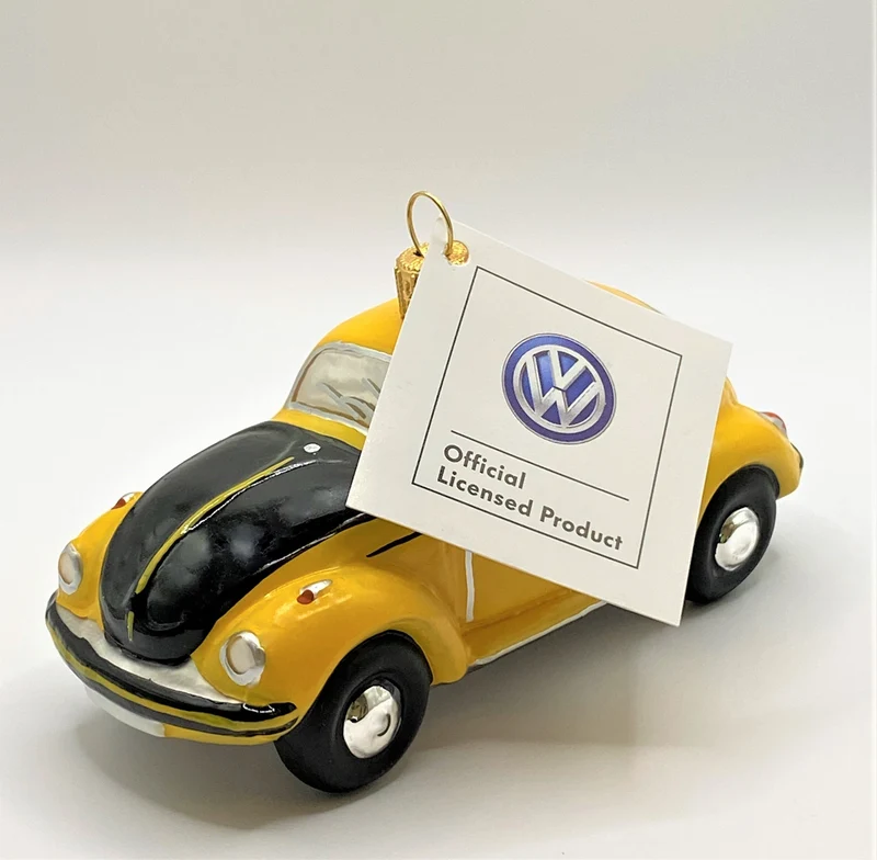 VW-Käfer Cabrio gelb, mit schwarzer Motorhaube