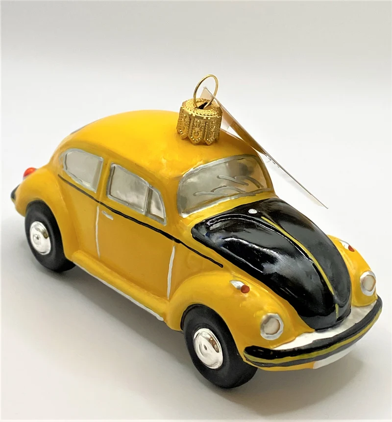 VW-Käfer Cabrio gelb, mit schwarzer Motorhaube