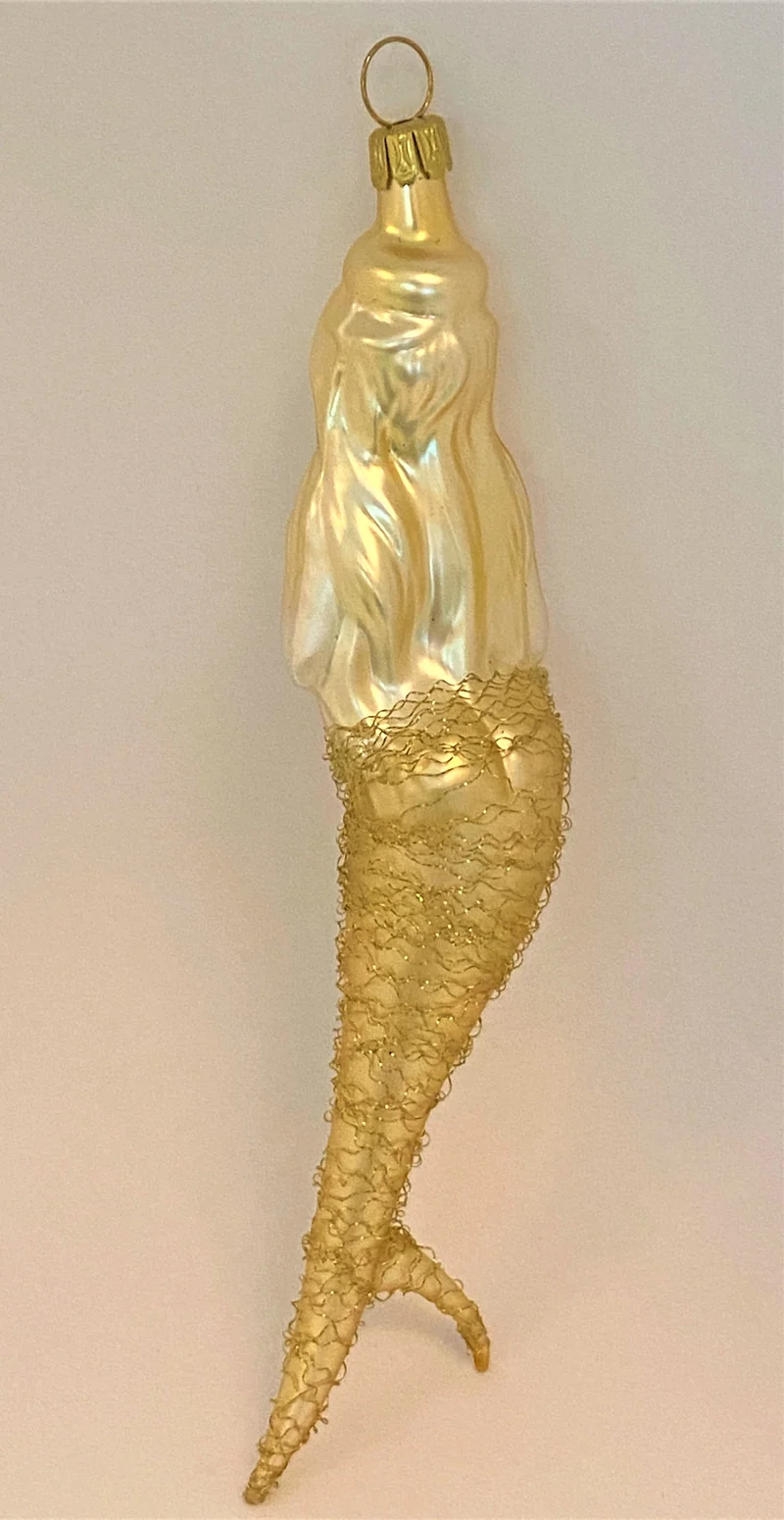 Klassische Meerjungfrau mit Goldfäden umsponnen