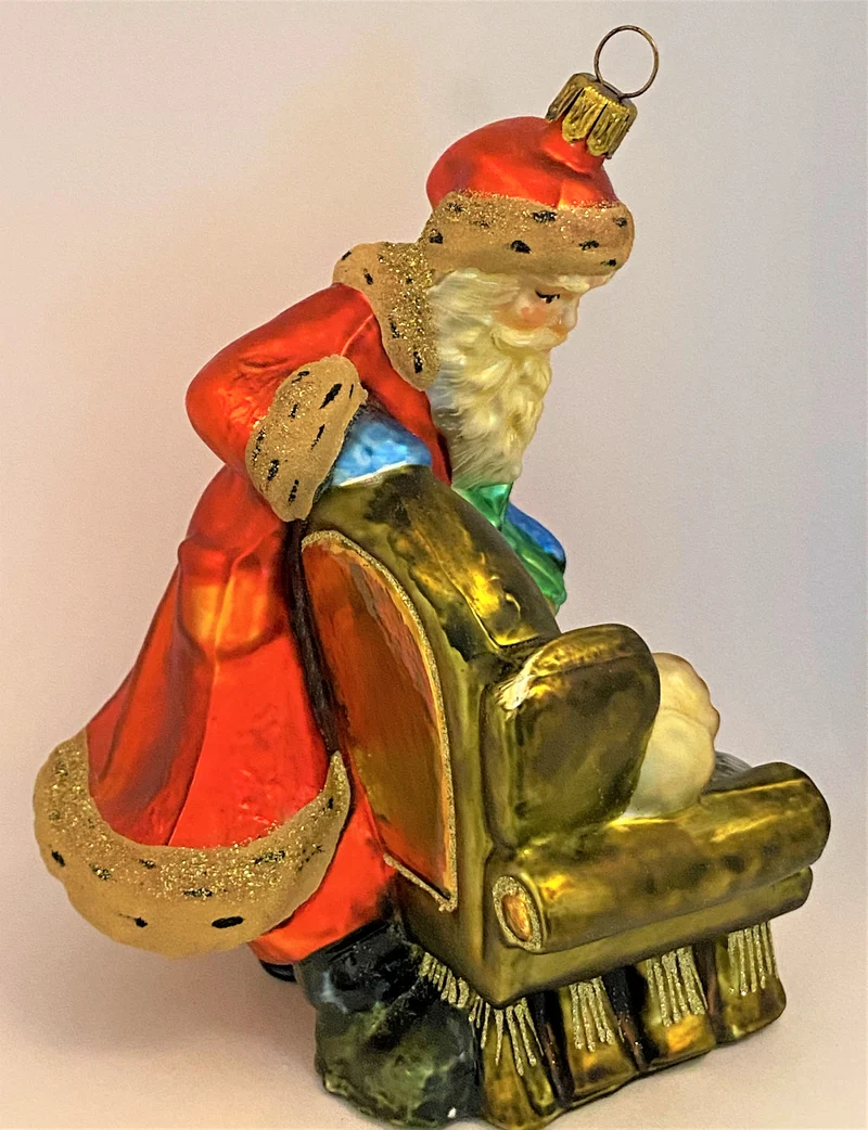 Weihnachtsmann bringt dem schlafendem Junge ein Geschenk, KOMOZJA MOSTOWSKI