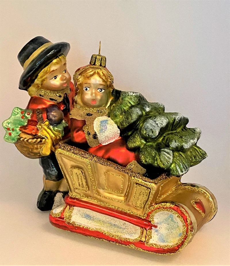 Die Kinder holen mit dem Schlitten den Weihnachtsbaum, KOMOZJA MOSTOWSKI