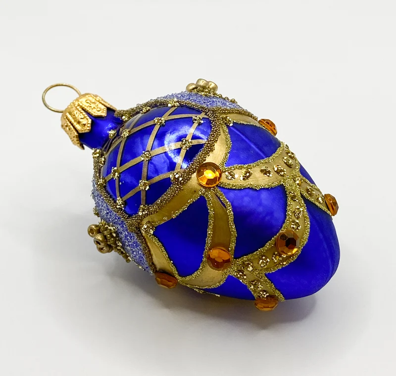 Kleines blaues Ei mit Gold-Dekor
